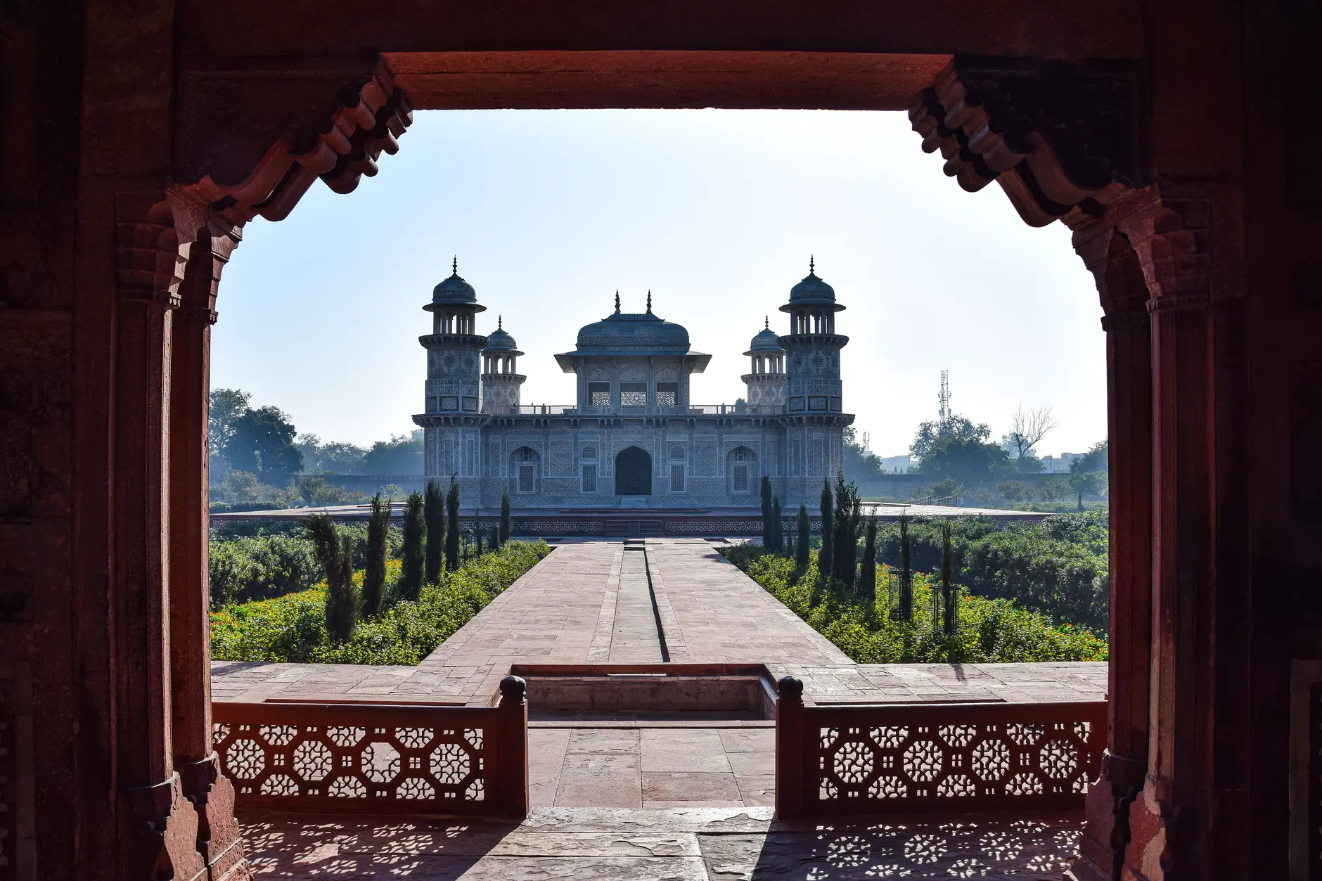Itimad-ud-Daulah tomb framed by an Agra red sandstone arch