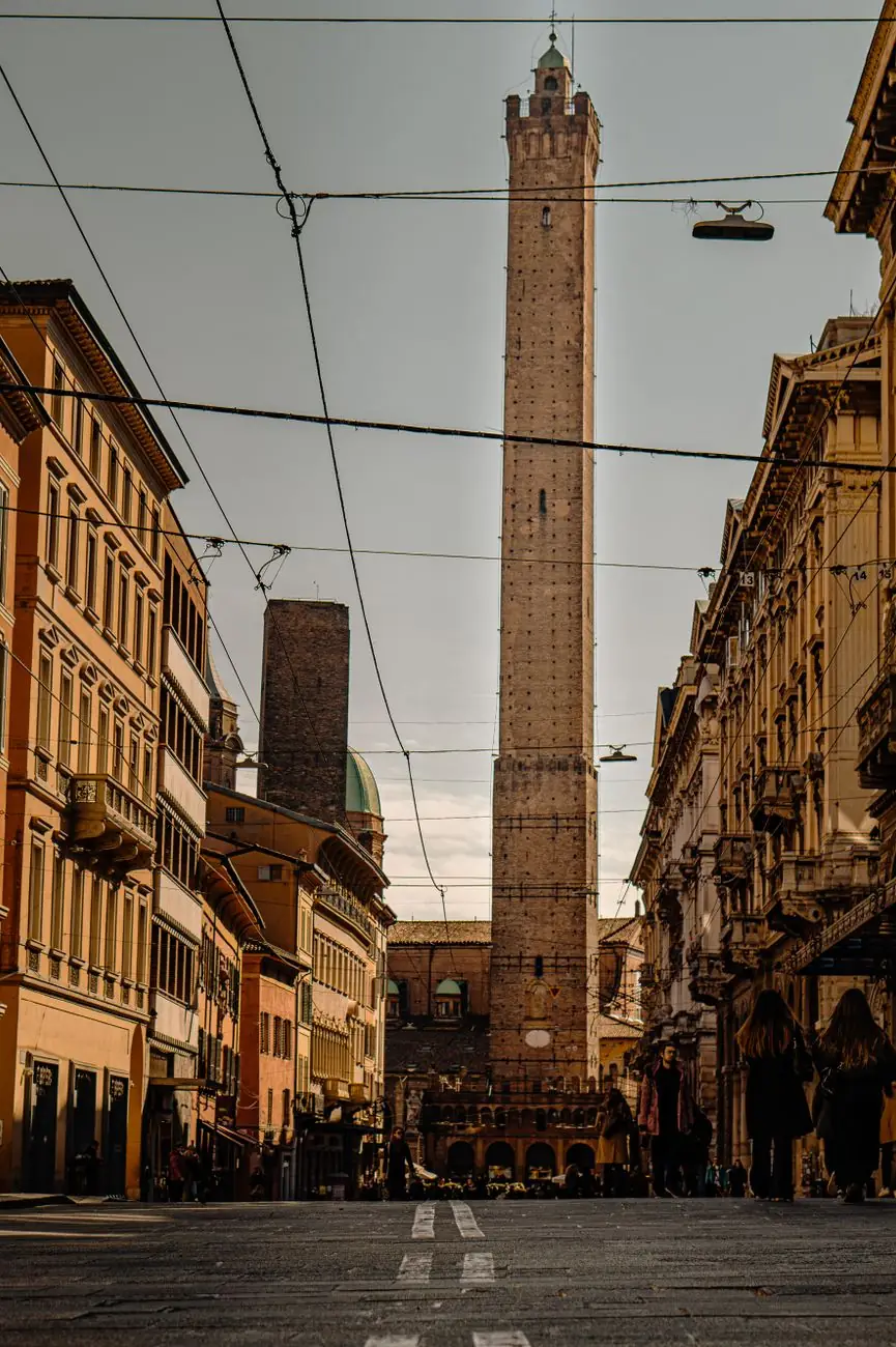 Asinelli and Garisenda towers above a Bologna street