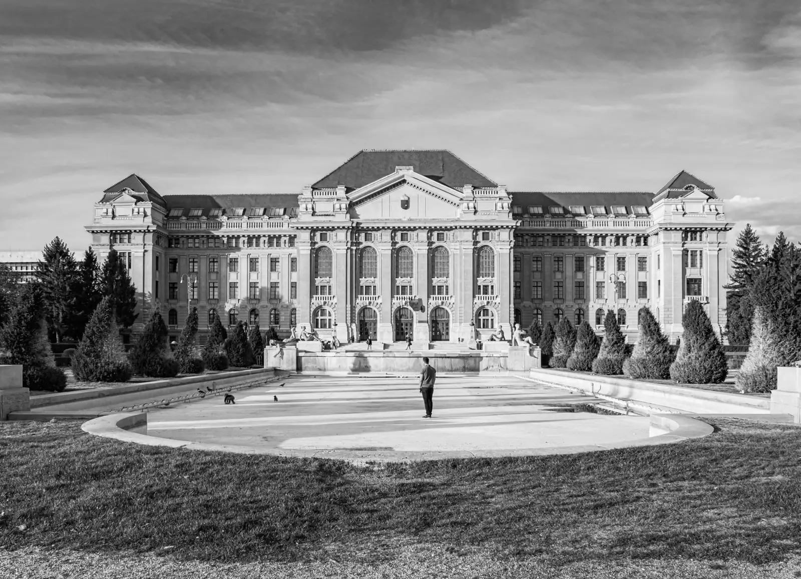 Black-and-white view of the University of Debrecen main building and its formal forecourt