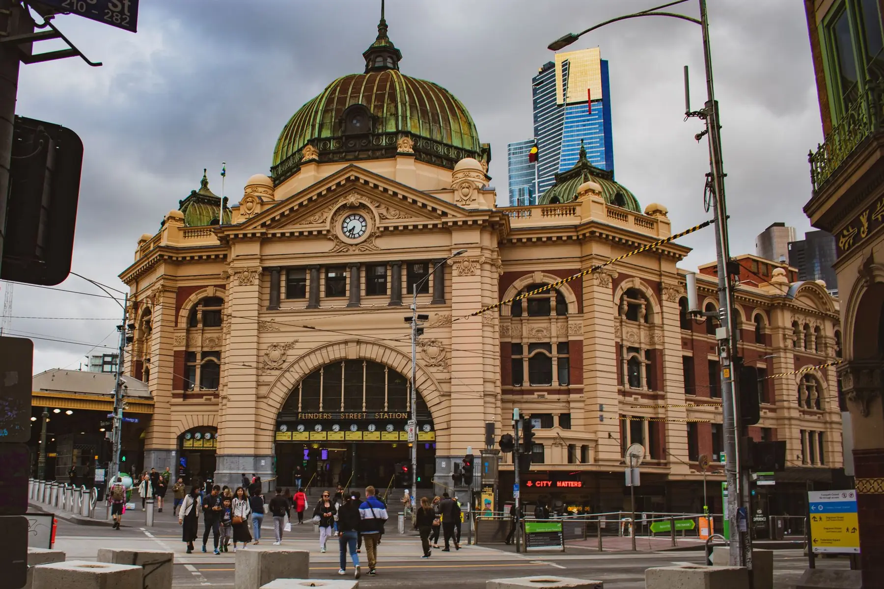 The dome, clocks and entrance of Flinders Street Station in Melbourne