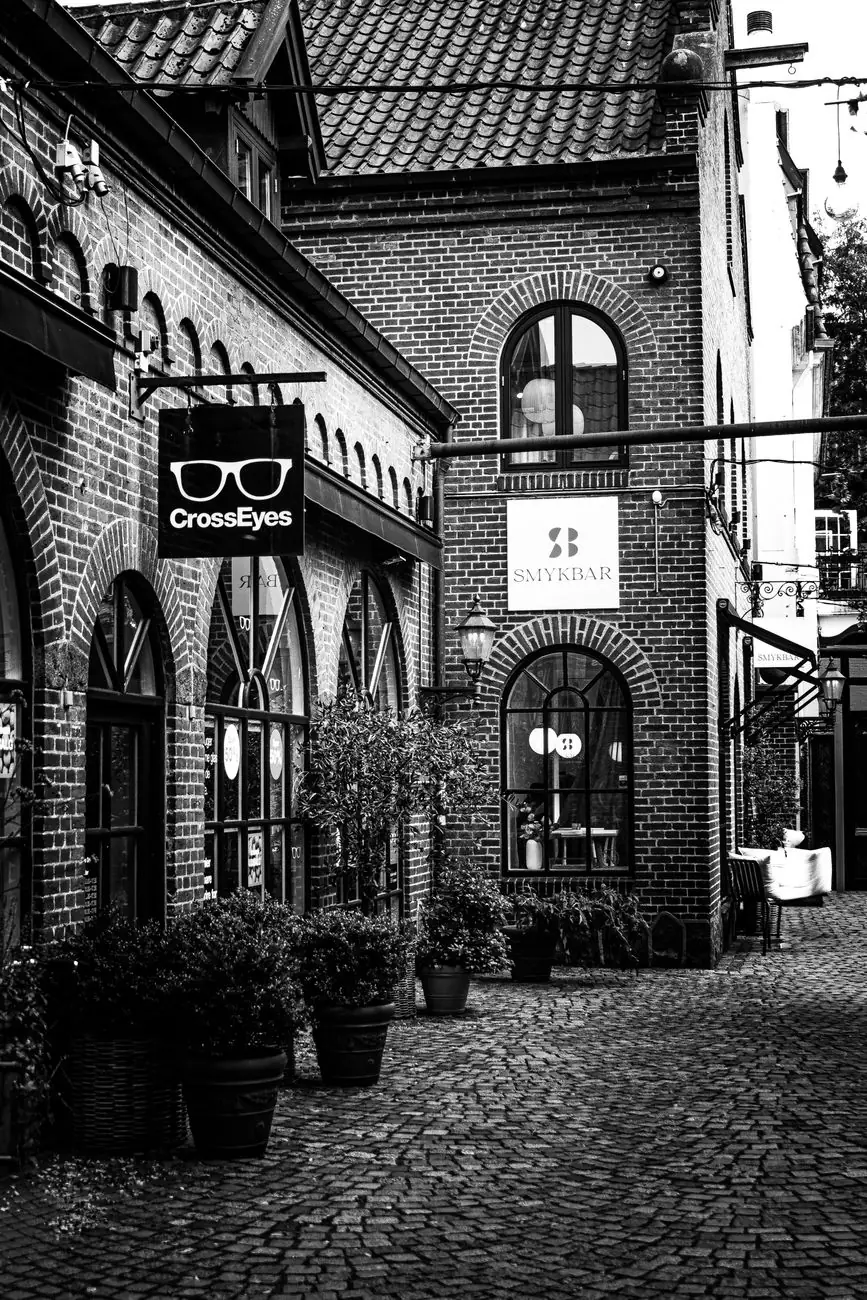 CrossEyes and S’BAR signs in an Odense courtyard