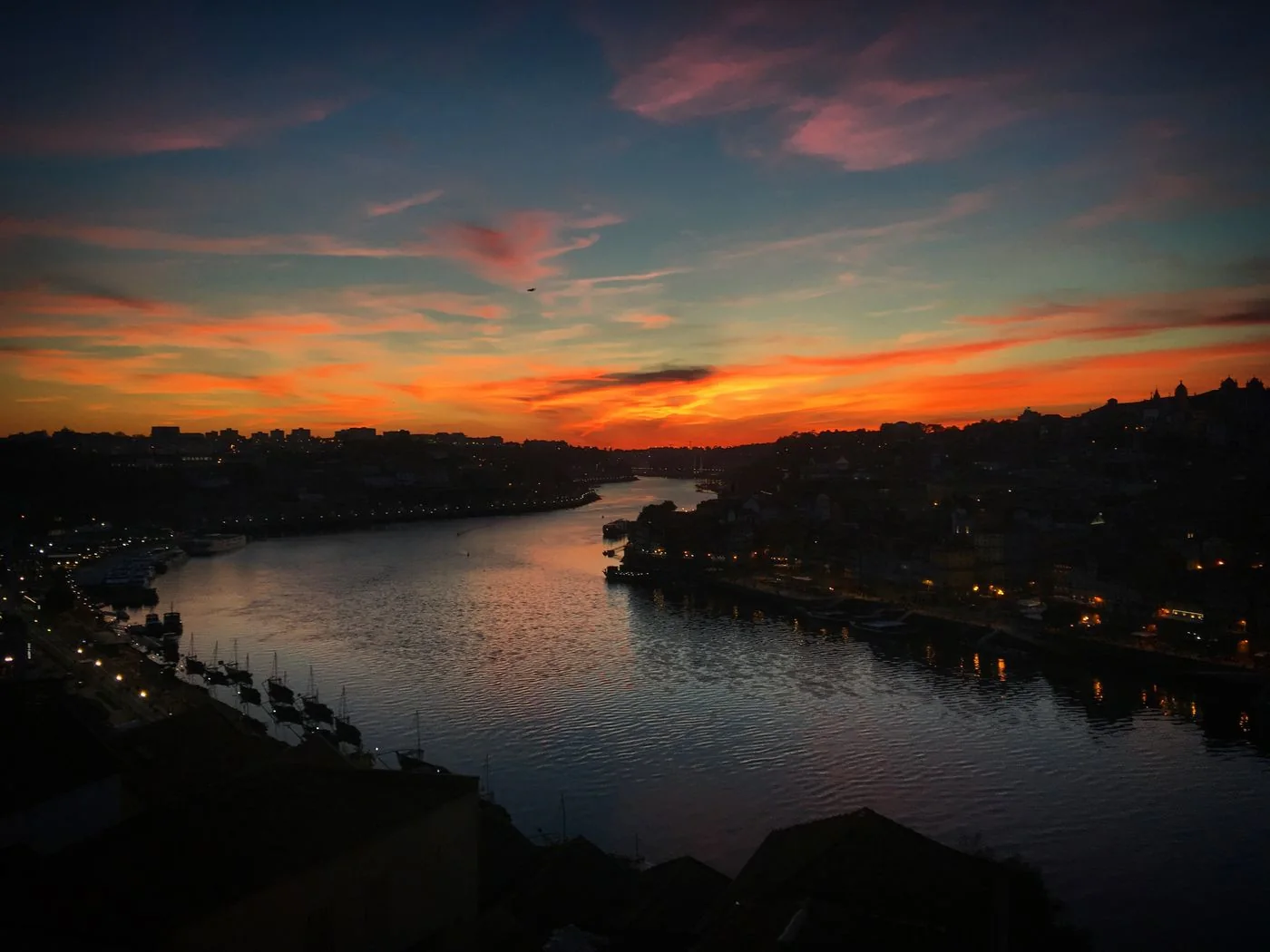 Sunset reflected on the Douro River in Porto