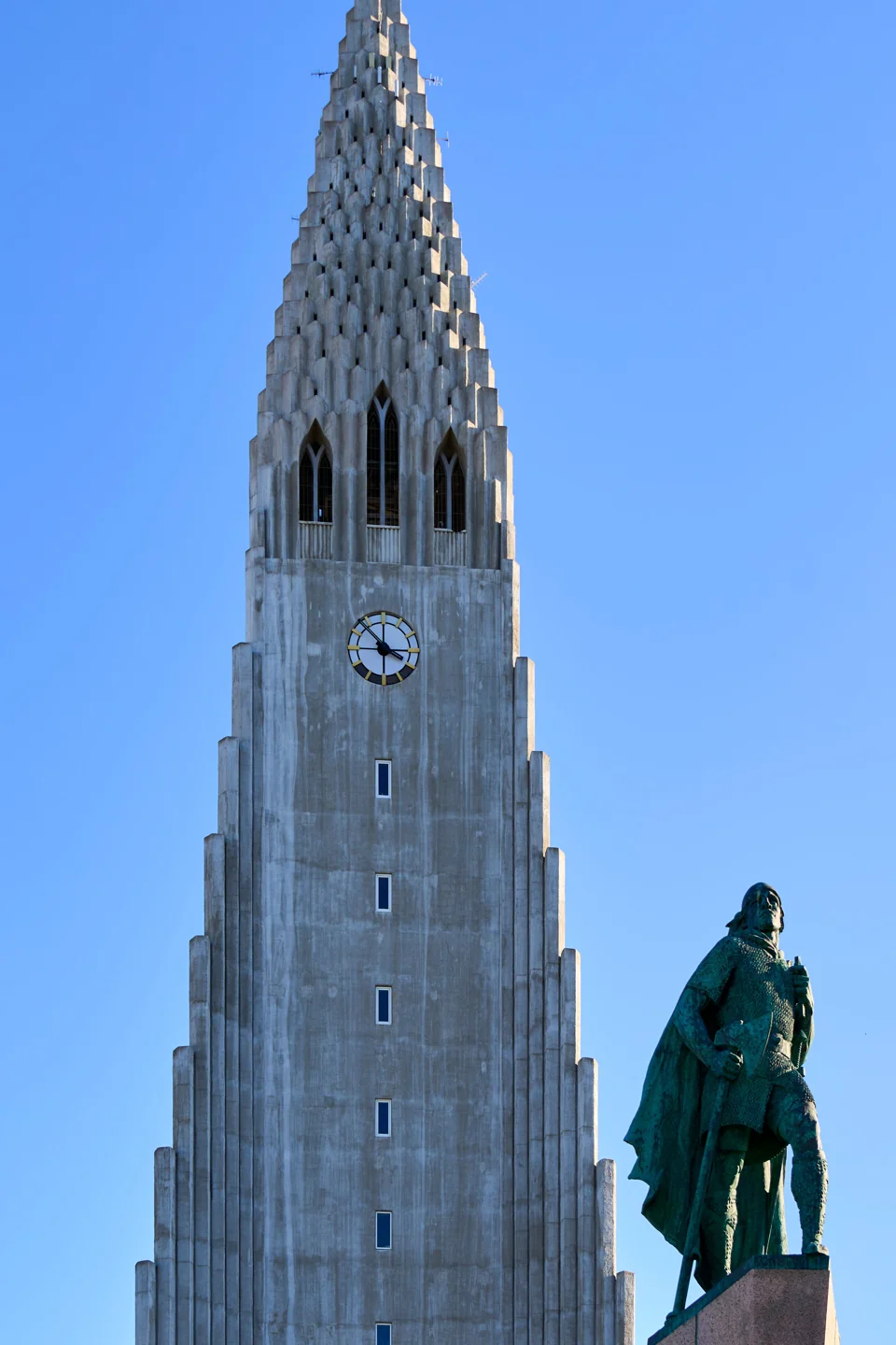 Hallgrímskirkja’s concrete tower and the Leifur Eiríksson statue in Reykjavík