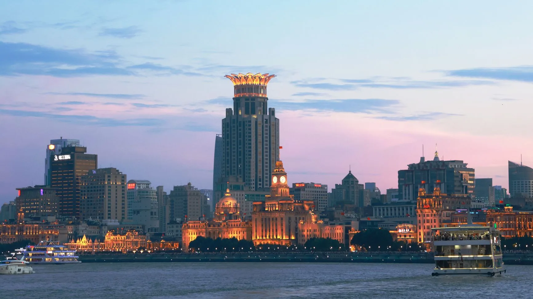 The Bund’s historic waterfront across the Huangpu River at dusk