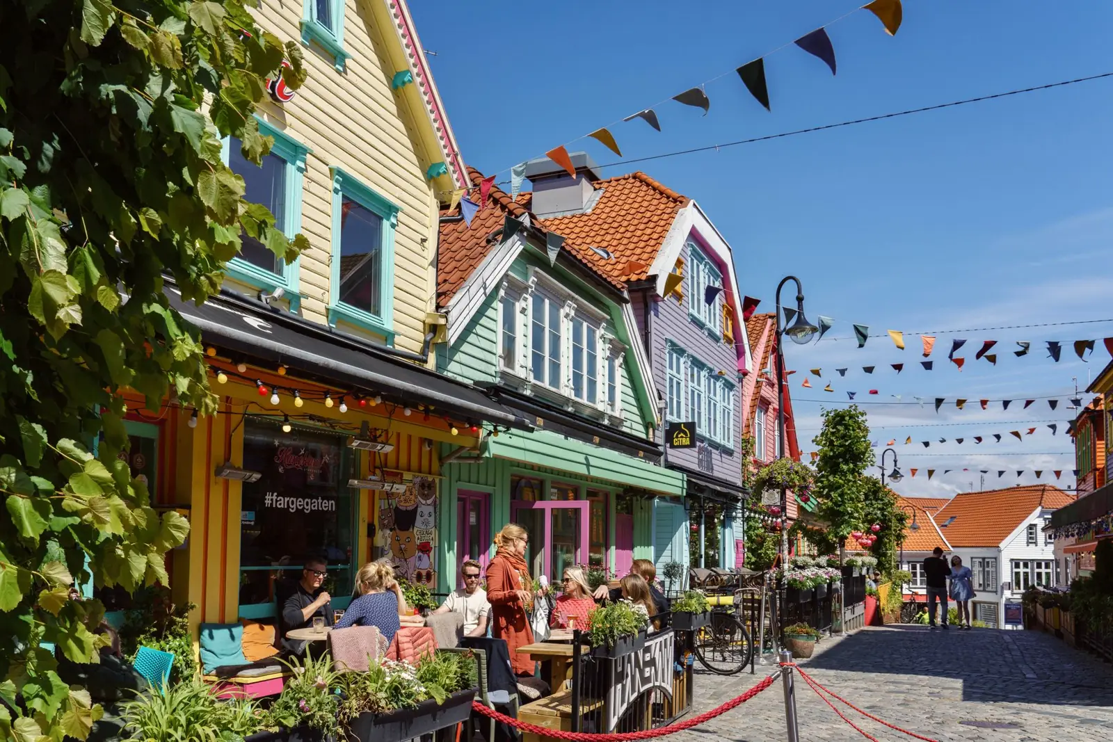 Colourful café fronts and bunting along Stavanger’s Fargegata