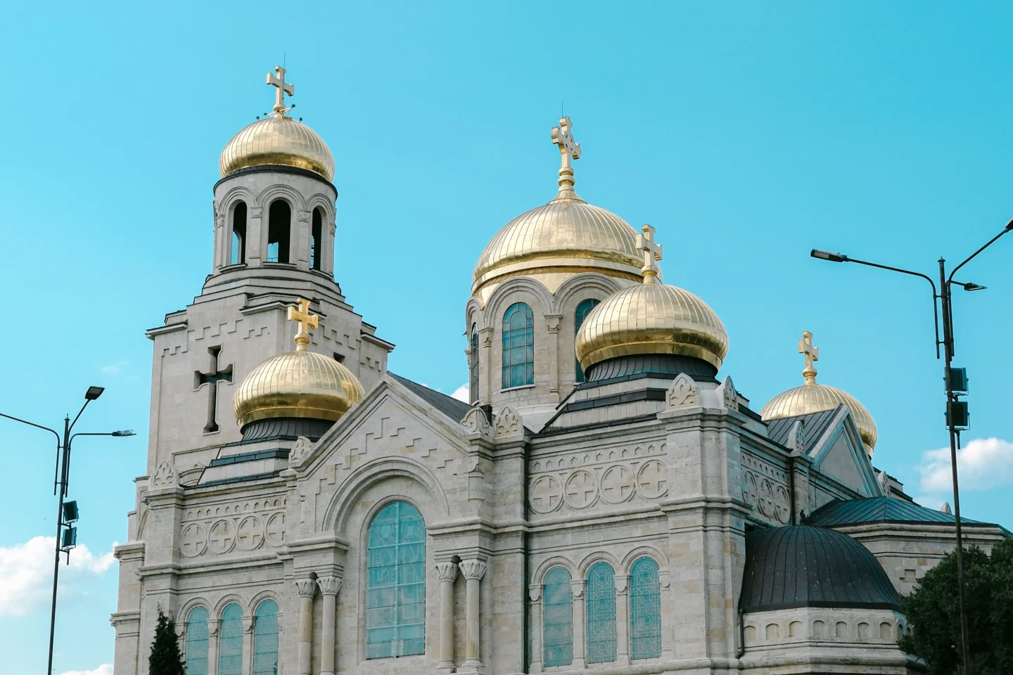 Close view of the gilded domes and stone façade of Varna’s Assumption Cathedral