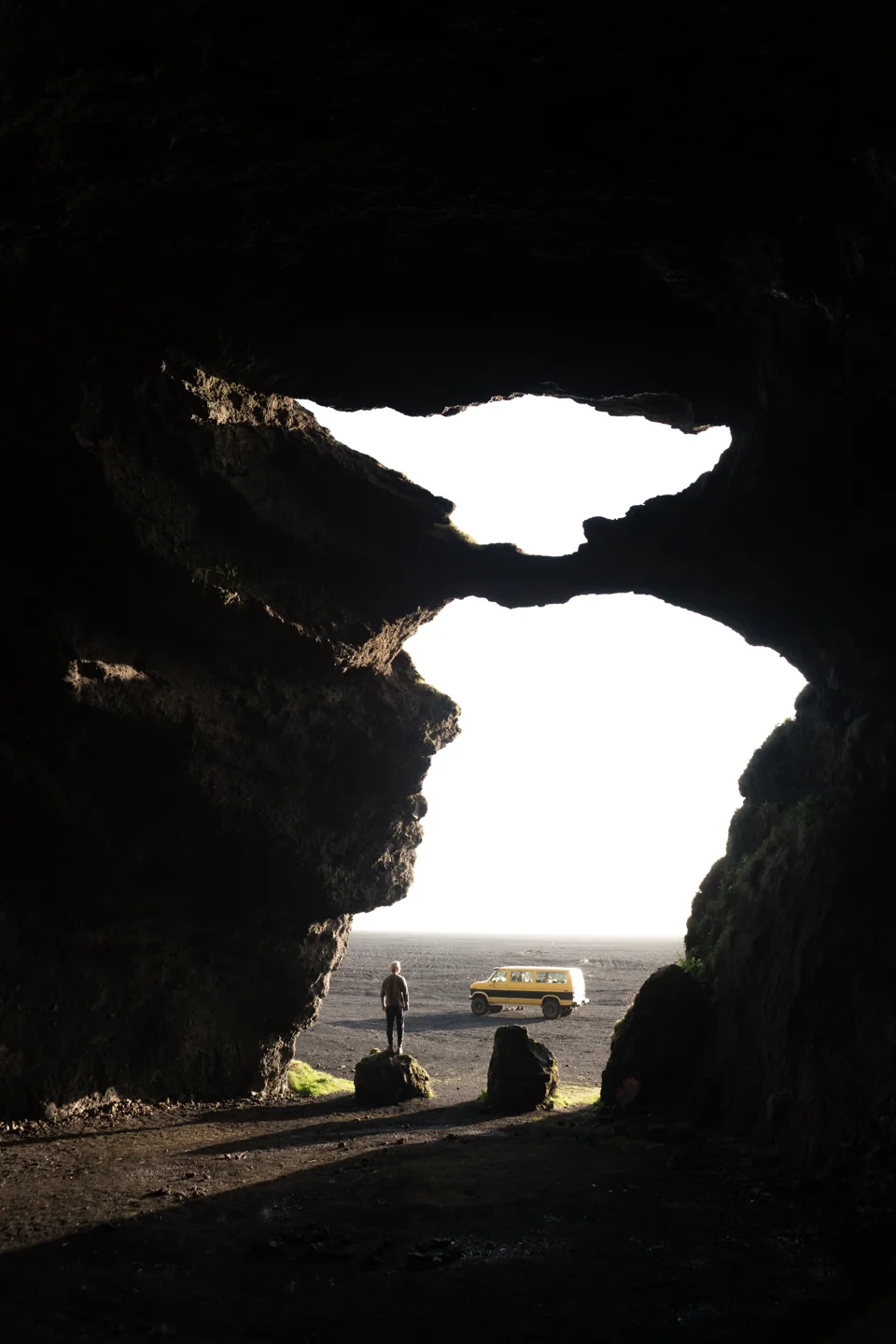 The distinctive opening of Gýgjagjá cave beneath Hjörleifshöfði