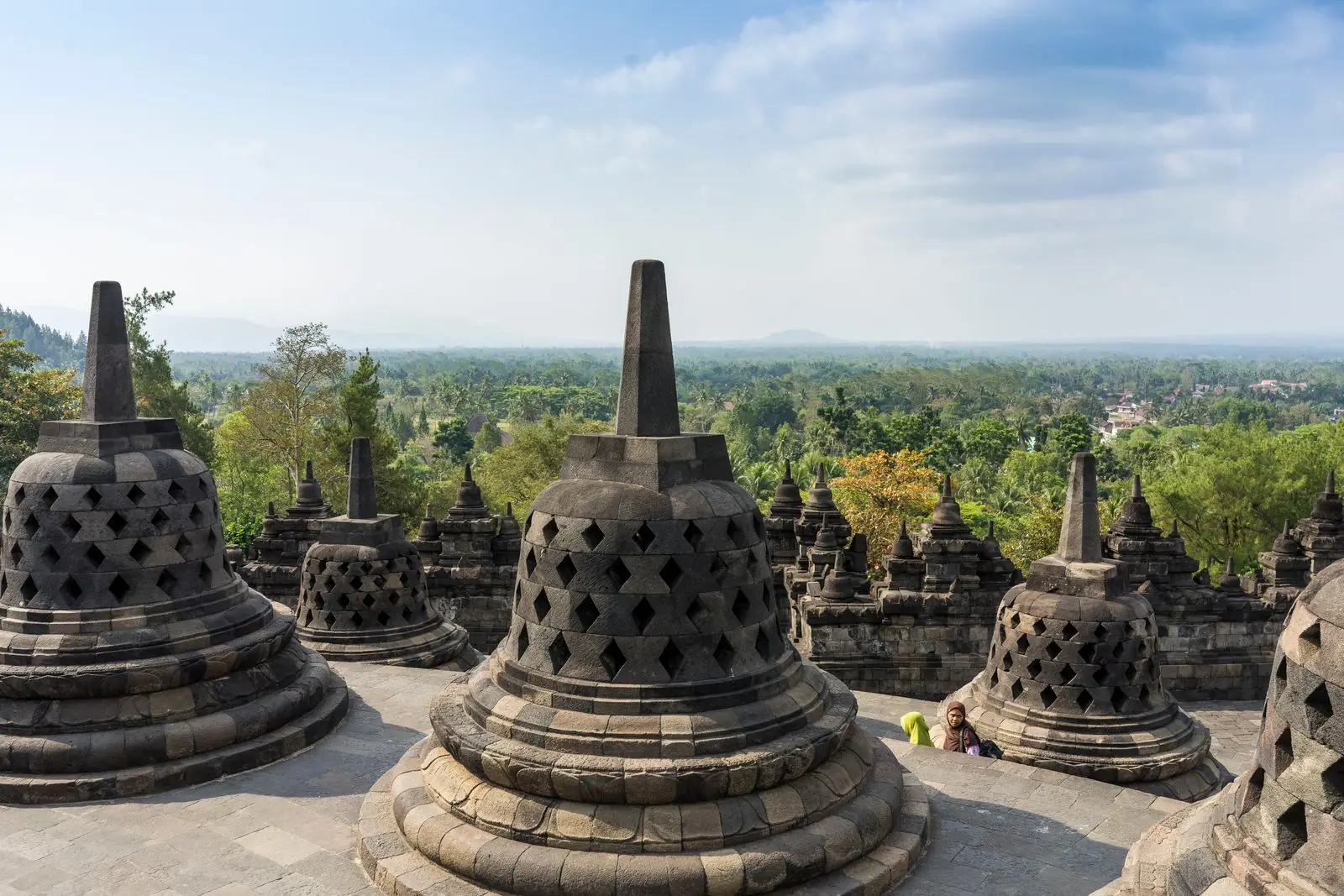 Borobudur’s stone stupas and carved terraces in daylight