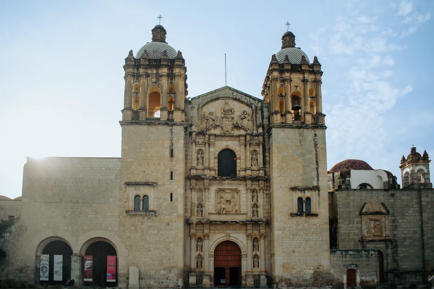 Twin towers and carved stone facade of Santo Domingo de Guzmán in Oaxaca