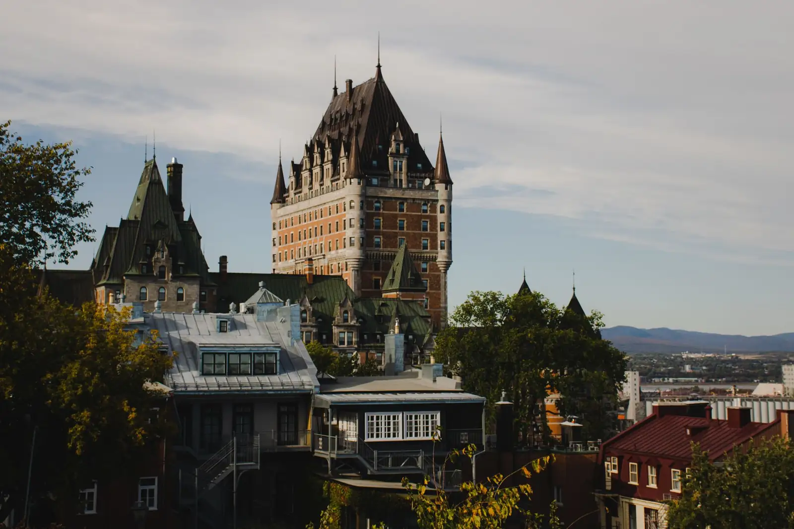 Château Frontenac above Old Québec’s historic rooftops with the St. Lawrence River beyond